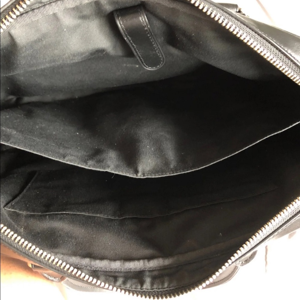 Lightly used, medium sized coach messenger bag